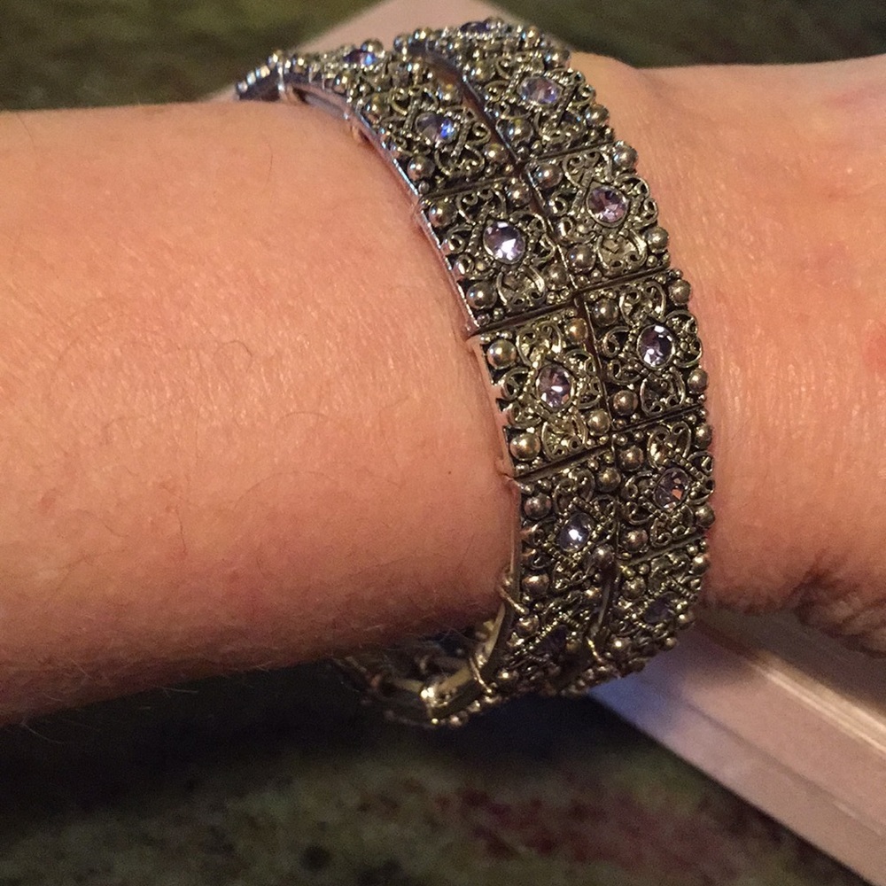 Pair stretch silver and amethyst crystal bracelets